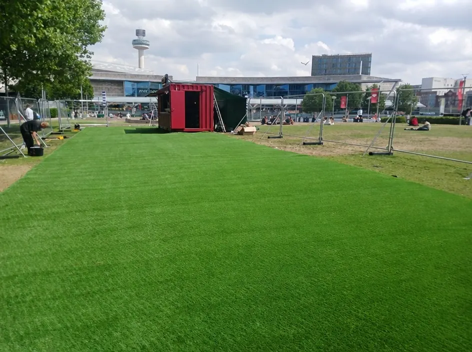 500 square metre artificial grass installation at the outdoor Flight Club summer bar in Liverpool