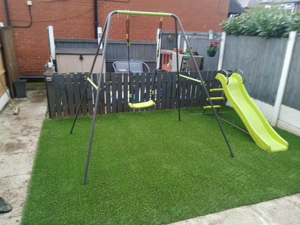 Children's play area artificial grass installation