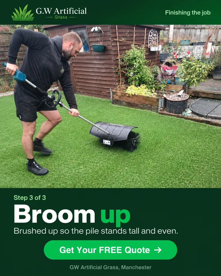 Power brushing the fitted artificial grass to lift the pile.